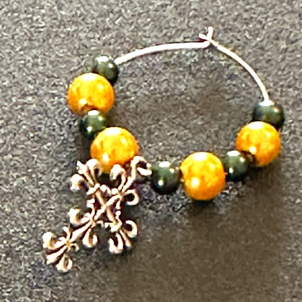 Wine glass tag, stainless steel hoop, green/gold beads, fancy cross charm